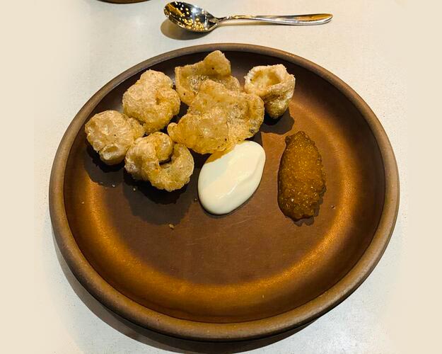 Pork rings and trout caviar